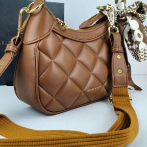 Charles and Keith Moon Face Brown Handbags